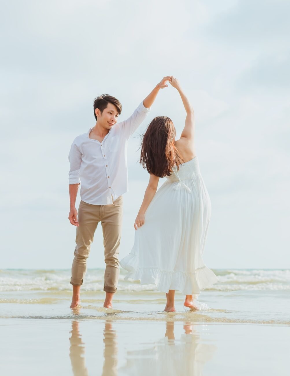 romantic time loving couple dance on the beach. Love travel concept. Honeymoon concept.
